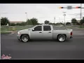 Dropped 2008 Chevy Silverado on 24s with a molded cresspo wing cruises the streets