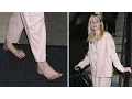 Elle Fanning Shows Off Her Funky Feet While Barefoot At LAX