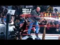 Stone Cold Steve Austin gives The Corporation a beer bath