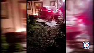 Car slams into Sunrise home injuring woman inside