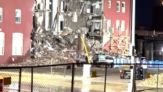 Kelsey Kernstine in Davenport from site of building collapse