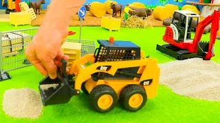 🚛Der Spielzeug Radbagger 🚜 und Kettenbagger arbeiten mit Sand auf der Baustelle 🚧