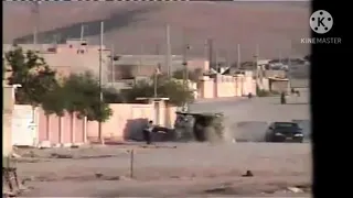 من الارشيف احد ابطال شرطة تلعفر 2006 يصد سياره مفخخة بكل شجاعة 