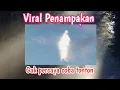 Viral Penampakan sosok di atas  awan