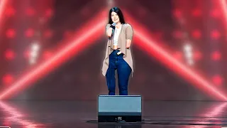 She Has the Microphone Strapped to Her Arm – Then Proceeds to Make Jokes About Hands!
