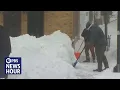 News Wrap Chaotic weather system delays U S travelers