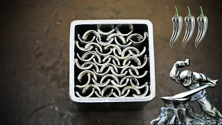 Damascus steel made from stainless flexible corrugated water hose.