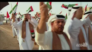 رفرف شامخا  يا علم    في سماء العز والفخر دندنها