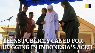 Teens publicly caned for hugging in Indonesia s Aceh province