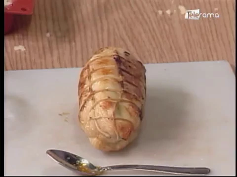 Enrollado de pollo en salsa de romero 