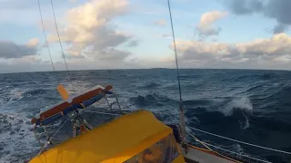 Sunset Sailing Mid Ocean