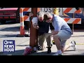 In aftermath of Michigan LDS church attack investigators seek gunman s motive