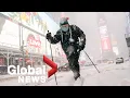 Massive snowstorm buries parts of Northeastern US