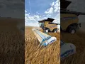 New Holland CR9.90 combine harvester with a stripper header
