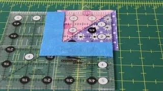 How to Square Up Half Square Triangles using a Creative Grids Square Up Ruler with Painter s Tape