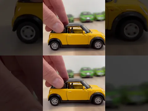 Yellow Model Cars Stopped By Finger