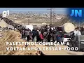 Download Lagu Jornal Nacional: Palestinos começam a voltar para a Faixa de Gaza após cessar-fogo entrar em vigor