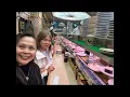 Dining at an authentic Conveyor belt sushi restaurant Oishi