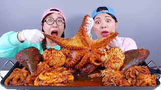 อาหารทะเลต้มรสเผ็ด ปลาหมึกยักษ์ กุ้ง มุกบัง DONA