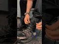 Uniform on boots laced and badge shining