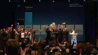 AfD crowd reacts to news of landslide victory in Saxony-Anhalt state elections | AFP