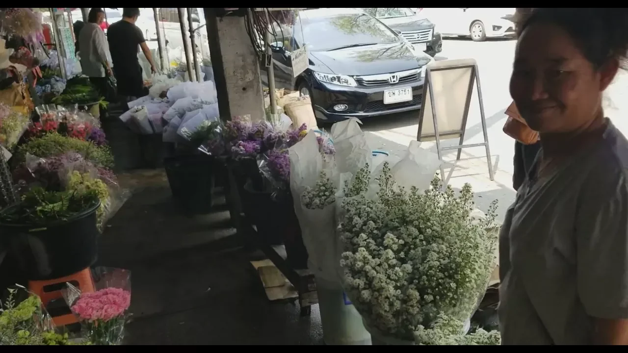 Nephew shopping for special event flowers   Life in Northern Thailand