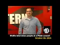 Wolfie interviews people at a Phish concert