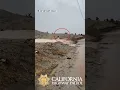 Car swept away in floodwaters in Palmdale