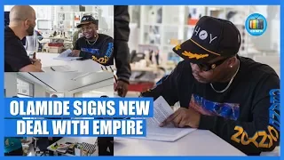 olamide signs new deal with empire flo fm tv