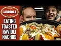 Eating RAVIOLI NACHOS from Labriola Cafe