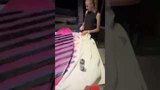 DIY surfboard paint job on a boat!! #sailingfamily #surfboardpainting #family #diy