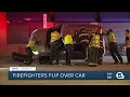 6 firefighters flip over Kia Soul after crash on East 13th Street and Carnegie