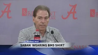Alabama coach Nick Saban wears a Bristol Motor Speedway shirt at weekly presser
