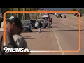 Law enforcement escort fallen parole officer in procession Tuesday