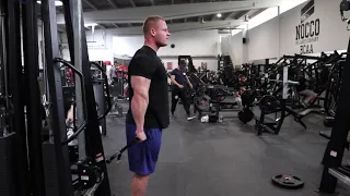 One arm cable front raise