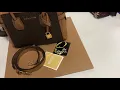 Michael Kors Mercer Small belted logo satchel brown