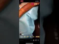 Asian da brat on Instagram live getting a tattoo of king von and listening to his music