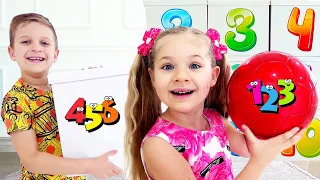 ديانا وروما يلعبان ويتعلمان لعبة من 1 إلى 10 