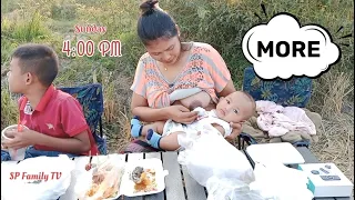 beautiful mom breastfeeding her baby milk and enjoy on sunday
