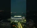 Keindahan Jakarta Internasional Stadium di malam hari.