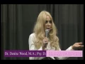 Dr Denise Wood Speaking Centerstage at Womans Expo