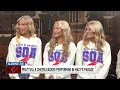 Prattville High School cheerleaders performing in Macy s Parade