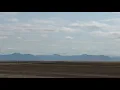 Mountains in the Rearview Mirror Highwood Montana 2026 Wheat Harvest