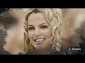 Britney Spears dismisses boob job and pregnancy rumours as she poses topless