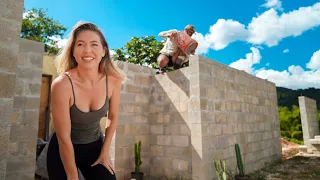 HAND POURING CONCRETE BUILDING A MASSIVE BLOCK WALL ON OUR ABANDONED PROPERTY!
