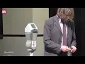 The Breakfast Club s Judd Nelson hops on motorcycle in suit and tie