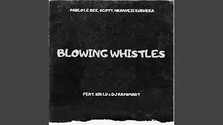 blowing whistles