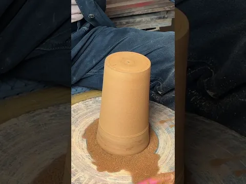 Watch the craftsman repairing the clay blank.