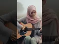 Download Lagu Heartfelt Melodies: Solo Acoustic Guitar by a Hijab-Wearing Artist in a Cozy, Peaceful Room