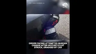 Motorcyclist dragged by car in violent road rage incident caught on